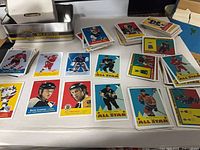 Stacks and spread of 2001-02 Topps Heritage hockey cards, visible players and All-Star subset