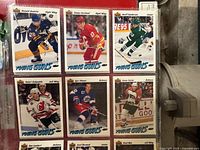 Six 1991-92 Young Guns rookie cards in binder page (Audette, Forslund, Sanderson, Zelepukin, Beranek, one other)