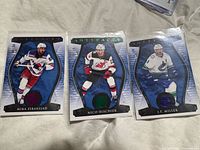 Fronts of all three Artifacts short print cards