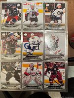 Front view of all nine cards in sleeve