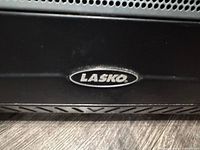 Close-up of Lasko logo on heater front