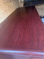 Top surface showing wood grain and condition