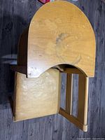 Top view showing side table surface wear and seat cushion