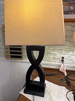 Single lamp showing entire form, shade and base