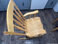 Top view showing contoured seat, arms, rockers