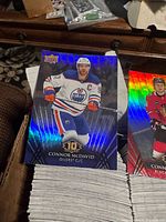 Connor McDavid 10th Anniversary card on top of stack