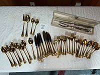Full flatware set and boxed carving set displayed