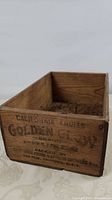 Exterior of box showing Golden Glow branding