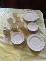 Full 30-piece place setting stack on table