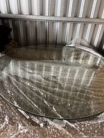 large round clear glass panel on bubble wrap