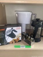 Group shot of Brita pitcher, Better Chef hand blender box, Bodum French press, knife sharpener