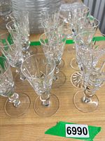 Group of cut crystal stemware from above front angle showing cuts and stems