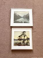 Both framed prints laid out for size reference