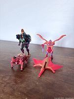 Group shot of all four Beast Wars figures in beast and robot modes