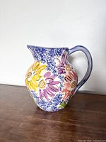 Full view of ceramic floral sponge-painted pitcher
