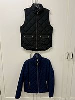 Front view of both vest and jacket showing overall design