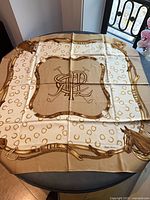 Entire scarf laid flat showing design and size