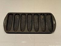 Top view showing seven corn-shaped molds