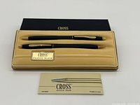 Pen and pencil set in case with leaflet