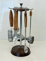 Front view of full bar set on stand