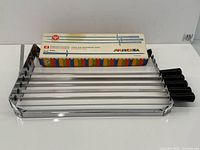 Rack with five skewers and boxed Julischka skewers displayed