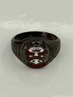 Front view showing enamel Bracebridge High School crest