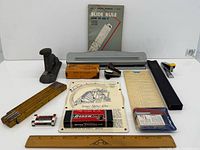 Overall lot view showing all desk tools and supplies