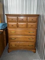 Front view of the five-drawer solid maple highboy dresser