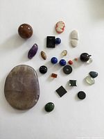 All stones laid out showing quantity, shapes and colors