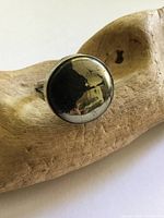 Front view of sterling silver ring showing 17 mm round cabochon stone