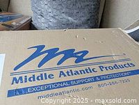Closed cardboard shipping box with Middle Atlantic Products logo