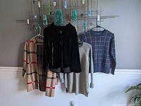 All four garments hanging for overview