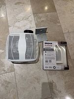 Fan grille, LED cover package, mounting bracket