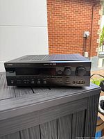 Front left angled view of Yamaha HTR-5170 receiver showing display, controls and overall condition