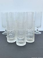 Front view of tumblers and goblets showing size difference and pattern