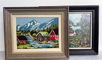 Both framed needlepoints side by side