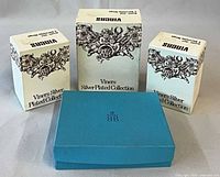 Three Viners retail boxes and closed blue case front view