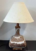 Lamp complete with shade