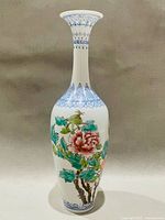 Full view of vase front showing peony motif and shape