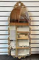 Full view of mirror showing shape, frame design and size context