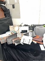 Overall view of beige snakeskin-print tote on table