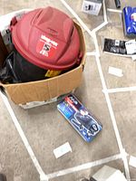 Shop-Vac canister vacuum and boxed handheld vacuum inside open cardboard box