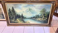 Framed oil painting full view showing landscape and frame