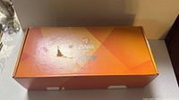 Closed orange Zumba Gold Live It Up retail box