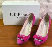 Full view of both pumps with LK Bennett box