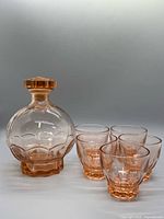 Carafe with stopper and five tumblers front view