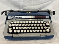 Front view of 1965 Smith Corona Classic 12 typewriter showing keyboard and branding