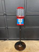 Full view of Beaver gumball machine on stand