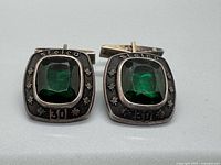 Front view showing design, engraving, stones