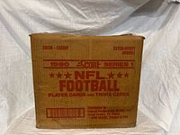 Front of master case showing Score 1990 Series 1 NFL Football markings